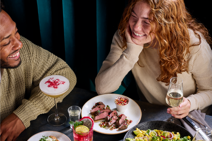 bottomless brunch people drinking with food on table