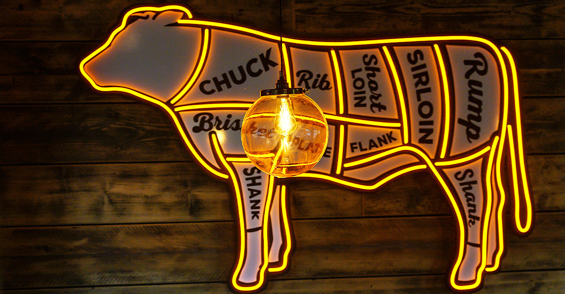 milton keynes bar and block neon cow sign